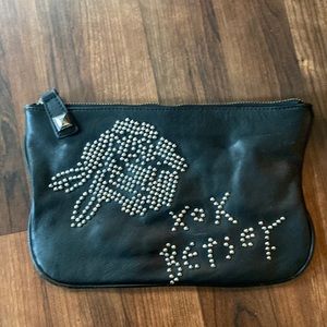 Betsy Johnson black leather clutch